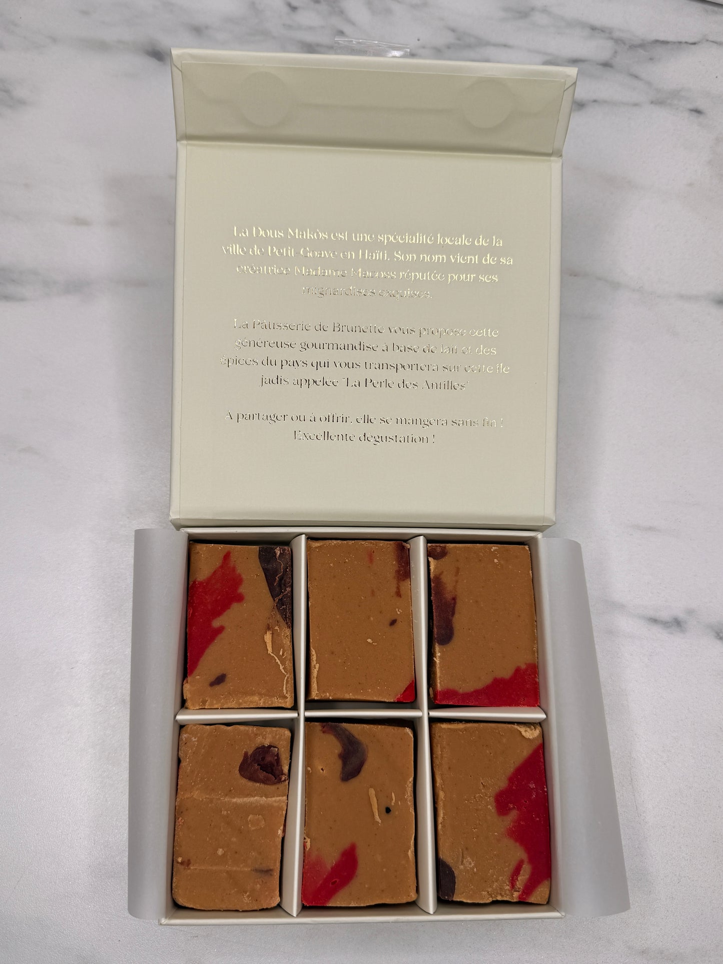 Dous Makos produit haïtien exclusif réalisé part la Pâtisserie de Brunette. En vente en France métropolitaine. Livraison en France. Retrait à Argenteuil sous 24h. 